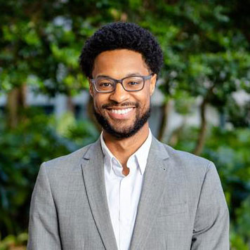 Portrait of Charles Cammack, Interim Executive Director of Undergraduate Admission at the University of Miami, smiling in a professional photo.